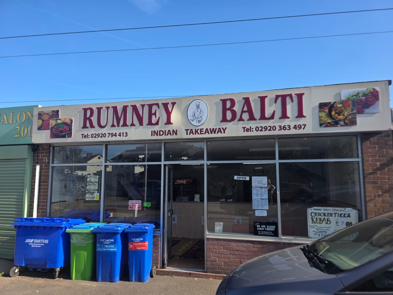 Fresh naan bread topped with balti curry at Rumney Balti